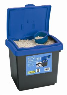 30 litre black and blue storage bin filled with rock salt. Lid is sprung open, salt is visible with small scoop sitting on top
